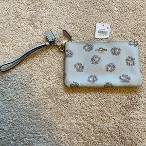 Brand new Coach small rose print wristlet